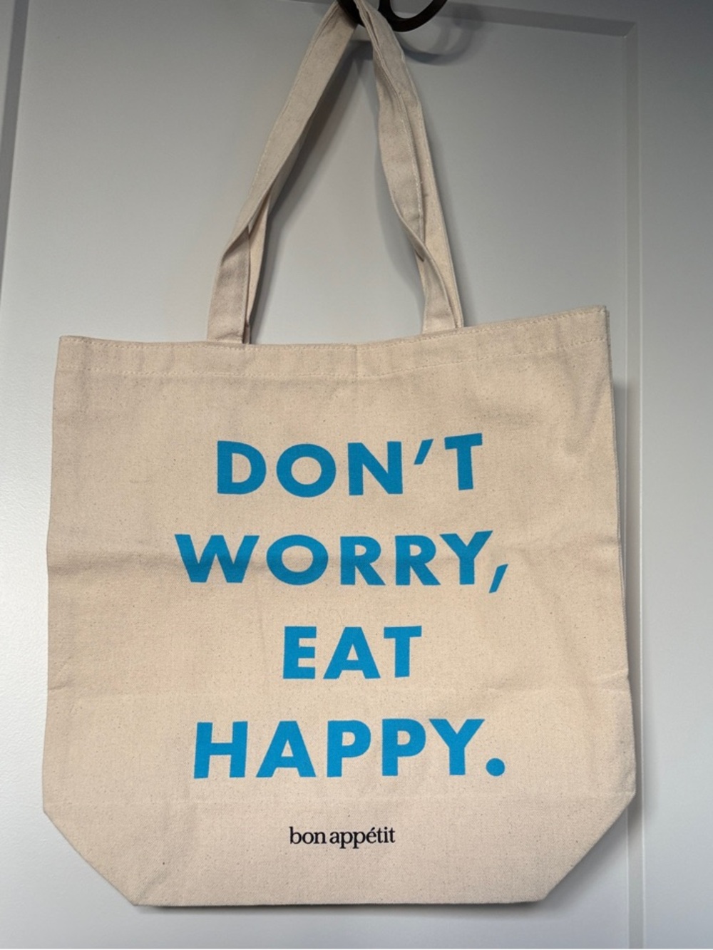 Bon Appétit 'Don't Worry, Eat Happy' Natural Canvas Tote with Blue Text